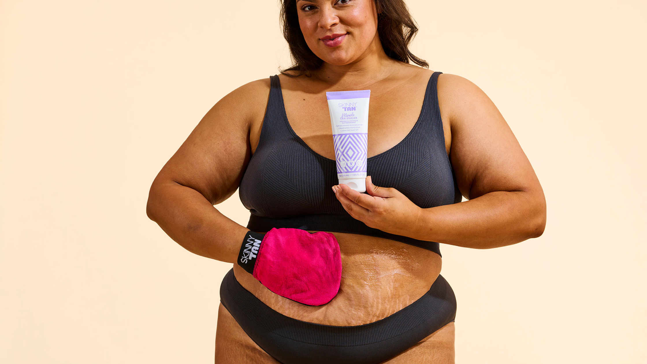 Model with Miracle Tan Eraser and Exfoliating Mitt