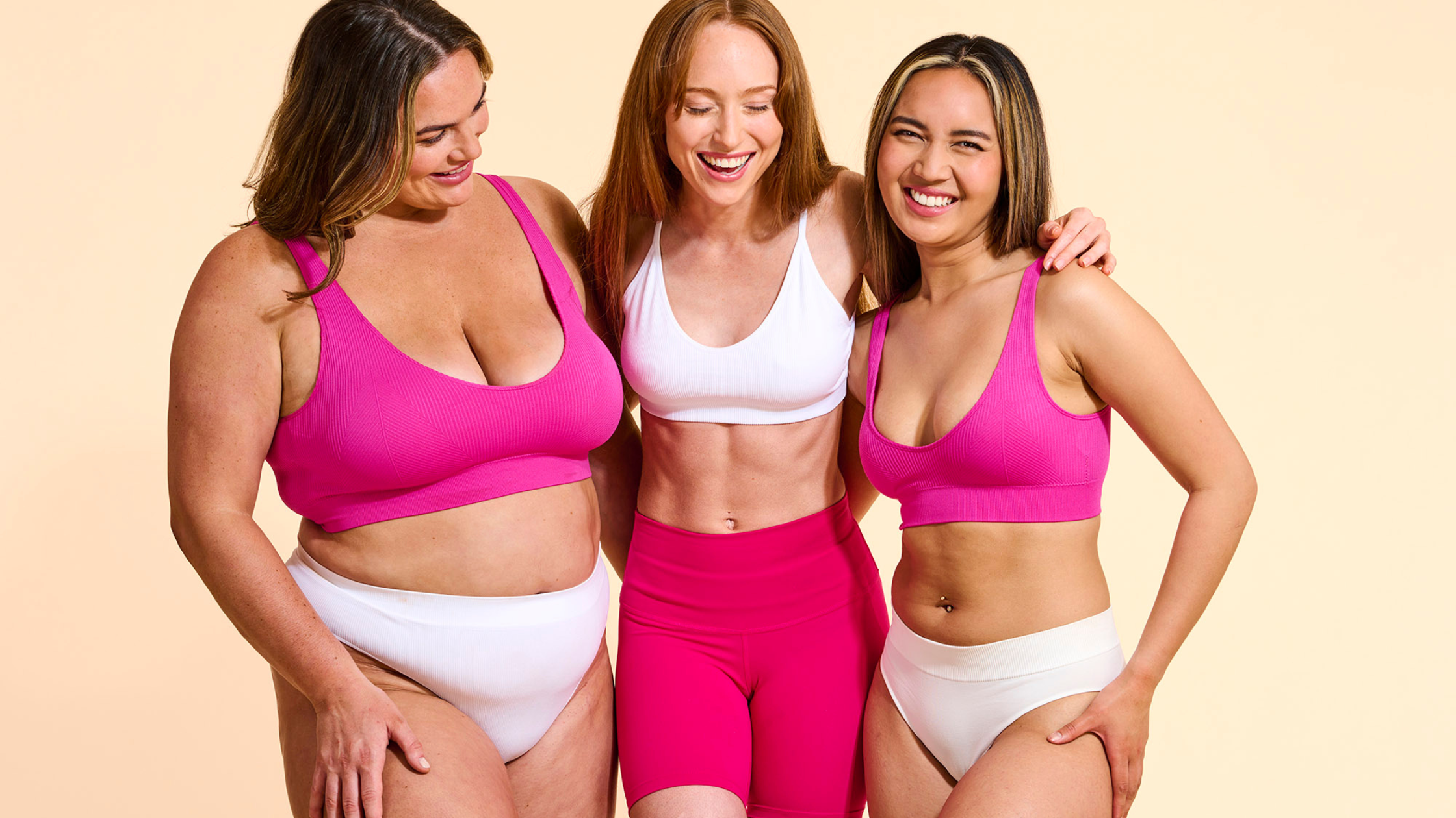 Group of tanned women smiling